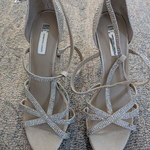 INC International Concepts "Reggigol" rhinestone strappy heels in pearl gold.